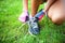 Female runner and athlete preparing shoes for jogging