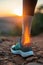 Female runner injures calf muscle and ligament sprain while running outdoors, foot bone on dirt path