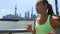 Female runner running in city of Shanghai China on famous boardwalk with skyline