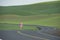 Female Runner on Rural Road