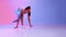 Female Runner Standing In Crouch Start Position Over Neon Background