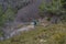 Female running in mountains at Lake Garda, Italy