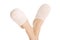 Female\'s feet with white slippers.