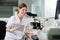 Female Scientist Holding Digital Tablet In Lab