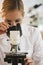 Female scientist with microscope