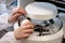 Female scientist working in laboratory, closeup. Medical research and development, A chemist using a centrifuge to test liquids,