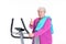 Female senior with thumb up train with fitness machine