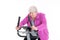 Female senior with thumb up train with fitness machine