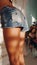 Female sensuality woman legs buttocks denim shorts