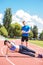 Female side plank exercsie with personal coach.