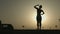 Female silhouette doing yoga exercises for harmony of healthy body and mind
