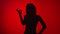 Female silhouette gesture fine ok having fun isolated at red. Shot on RED Raven 4k Cinema Camera