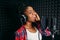 Female singer songs in audio recording studio