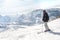 Female skier enjoy in beautiful snowy alps mountain range scenic
