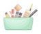 Female skin care cosmetic products in cosmetic bag. Turquoise bag full of typical woman things and accessories as