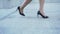 Female in smart high heel shoes walking upstairs, confident businesswoman career