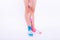 Female smooth legs in colored socks. Epilation