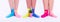 Female smooth legs in colored socks. Epilation.