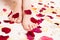 Female soft feet in rose petals