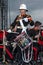 Female soldier playing drum in military band, Sunderland