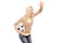 A female sport fan holding a football and shouting