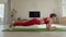 Female sportsman performing plank to train her muscles