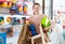 female standing in the children's store with toys