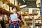 Female storekeeper checks presence of goods in the building materials warehouse