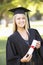 Female Student Attending Graduation Ceremony