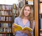 Female student reads the book