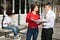 Female Student And Teacher Discussing Over Book On