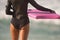 Female Surfer Stands Beach Watching Surf Waiting Pink Body Board