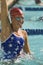 Female Swimmer Celebrating Victory In Pool
