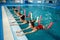 Female swimmers group, aqua aerobics training