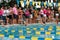 Female Swimmers About To Start Backstroke In Meet