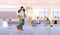 female teacher with book in classroom happy labor day celebration concept horizontal