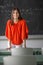 Female teacher in front of a classroom