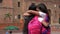 Female Teen Students Hug