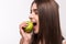 Female teeth and apple. Healthy eating on white background