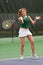 Female Tennis Player Hits Forehand Shot