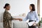 Female Therapist And Happy Black Soldier Woman Handshaking In Office After Meeting