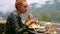 Female tourist eating breakfast