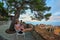 Female tourist enjoying Taormina view at sunset