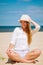 Female tourist resting on beach.