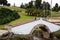 Female tourist taking pictures at the famous historic Bridge of Boyaca in Colombia. The Colombian independence Battle of Boyaca