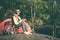 Female tourists camping in beautiful nature in tranquil scene.