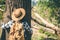 Female tourists embrace the tree with love