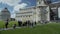 Female tourists photographing near Pisa Cathedral and Tower, sightseeing