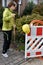 Female trainee at work at roadworks