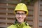 Female trainee with yellow security helmet